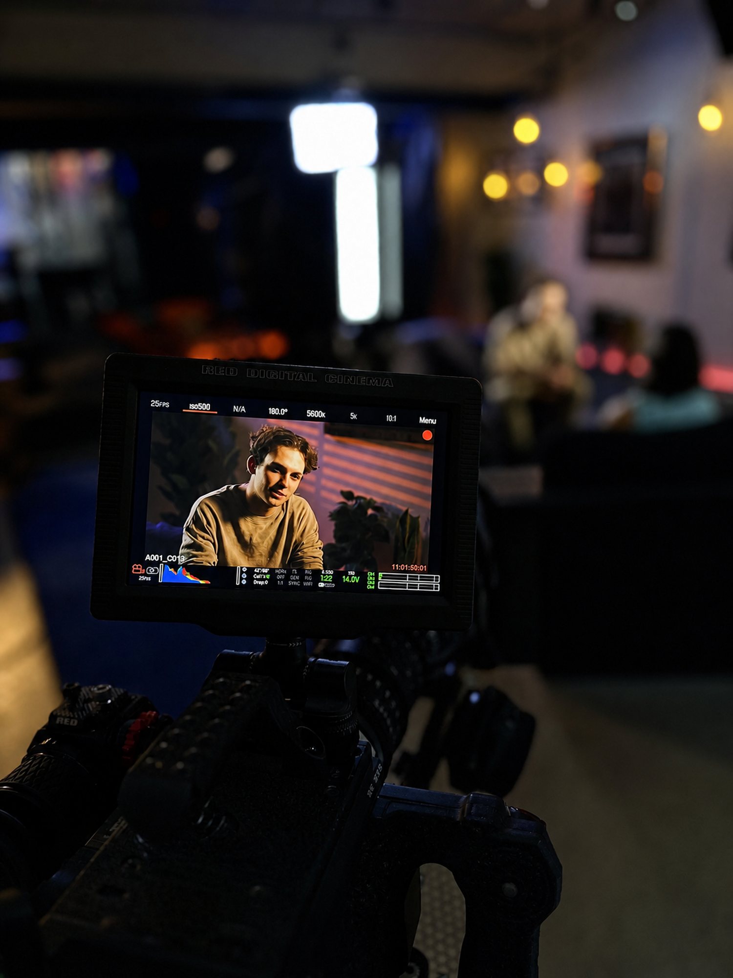 Monitor close-up of an actor mid-performance at JJ Splice